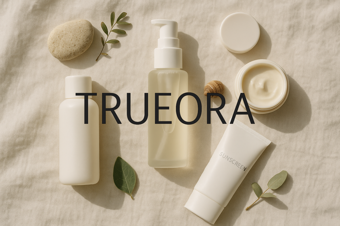Minimalist clean beauty skincare set including toner, lotion, cream, and sunscreen, styled on a soft white linen cloth with natural elements like leaves and stones – promoting skinimalism and sustainable beauty in 2025.