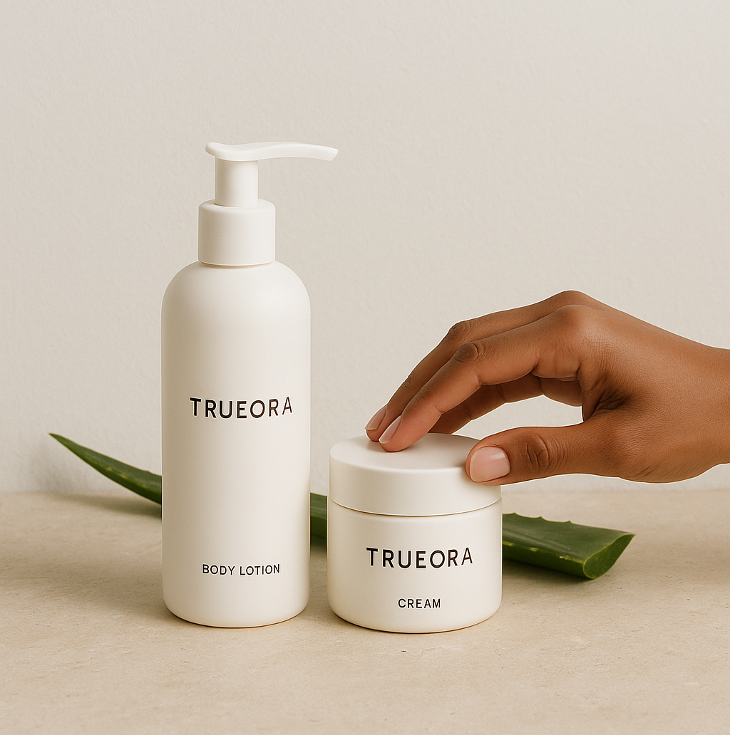 Trueora fragrance-free body lotion and cream displayed on a neutral background with an aloe leaf and a gentle hand, promoting clean skincare for sensitive skin.