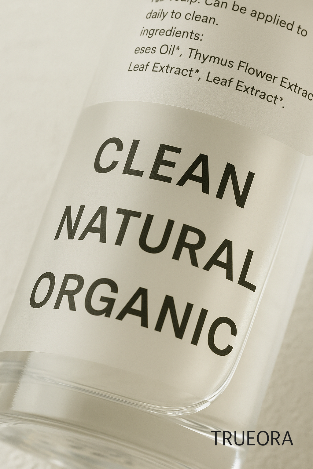 Close-up of a minimalist skincare bottle labeled "CLEAN," "NATURAL," and "ORGANIC" in bold black text, symbolizing transparency and ingredient clarity in clean beauty.